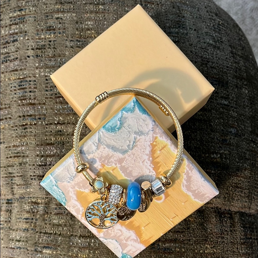 Gold Charm Bracelet with Blue Accents